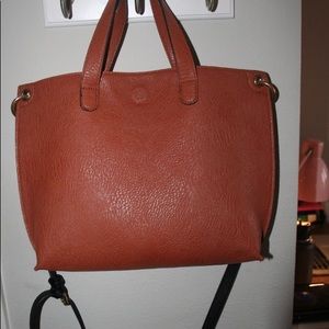 Urban Outfitters reversible crossbody bag.